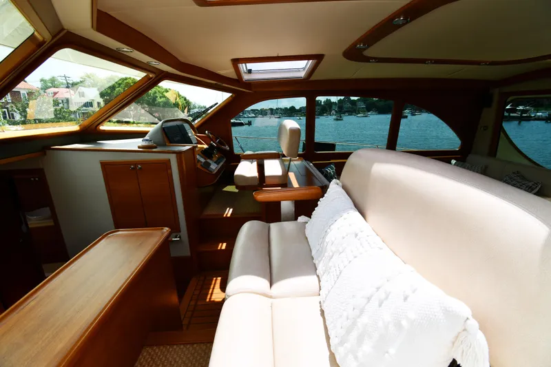 Mack Yacht Photos Pics Luxurious interior of 2020 Palm Beach Motor Yachts PB52 with elegant seating and scenic views.