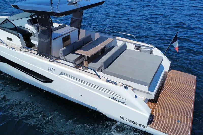 Blue Moon Yacht Photos Pics Modern 2021 Fiart 43 yacht with spacious deck and elegant design on open water.