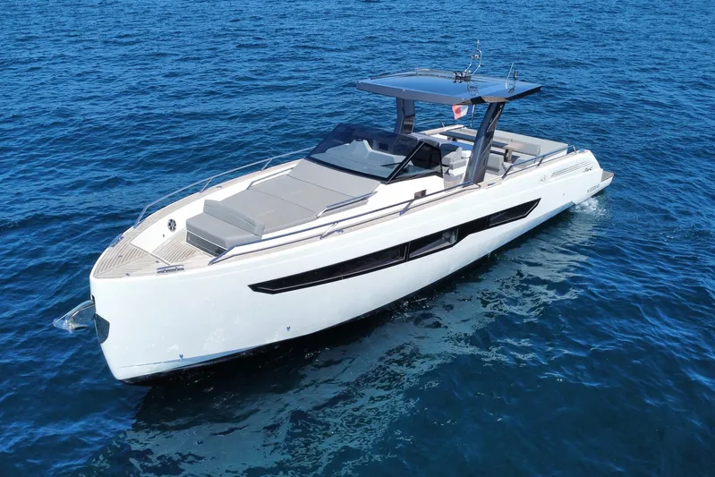 Blue Moon Yacht Photos Pics 2021 Fiart 43 yacht on open water, showcasing sleek design and modern features.