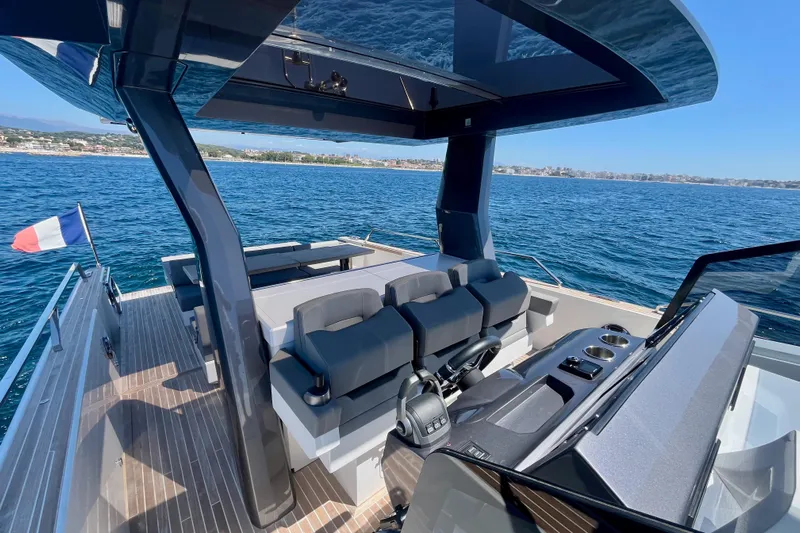 Blue Moon Yacht Photos Pics Luxurious 2021 Fiart 43 yacht with sleek design, spacious deck, and scenic ocean view.