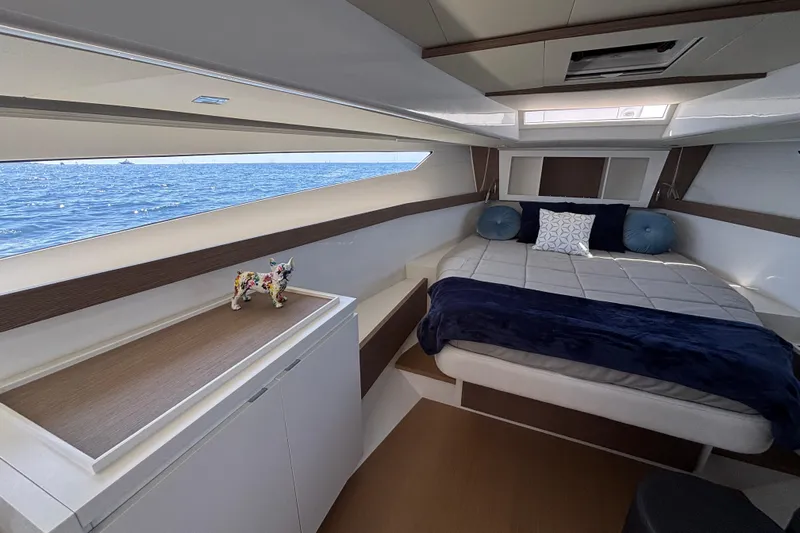 Blue Moon Yacht Photos Pics Luxurious cabin interior of 2021 Fiart 43 yacht with ocean view.