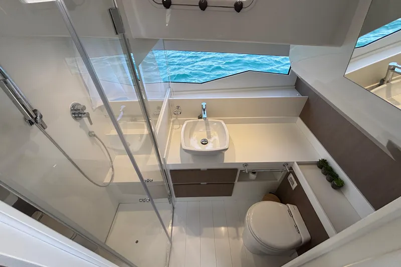 Blue Moon Yacht Photos Pics Modern bathroom interior on 2021 Fiart 43 yacht, featuring sleek design and ocean view.