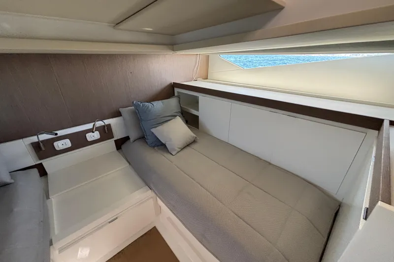 Blue Moon Yacht Photos Pics Interior cabin of 2021 Fiart 43 yacht with modern design and comfortable bedding.