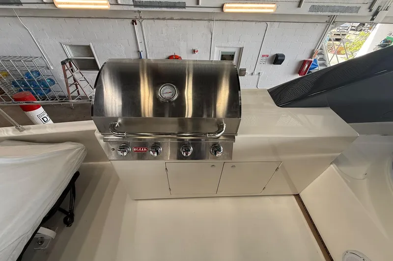 Evolution Yacht Photos Pics Outdoor grill on 2013 Ferretti Yachts 800, featuring stainless steel design and control knobs.