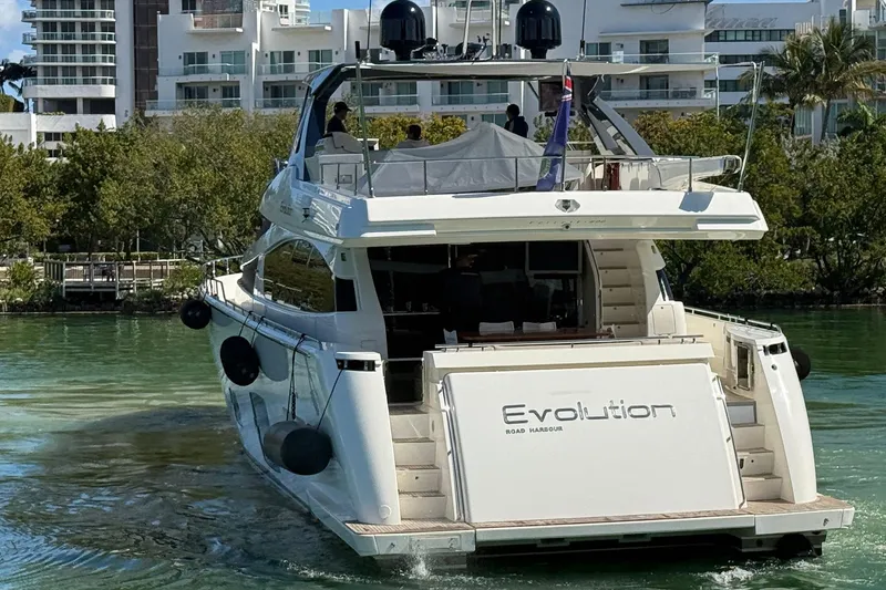 Evolution Yacht Photos Pics Luxury Ferretti Yachts 800, 2013 model, cruising in a scenic waterfront setting.