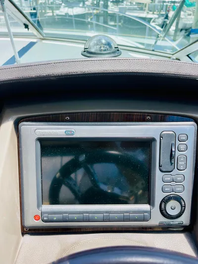 Seas The Day Yacht Photos Pics 2012 Cruisers 350 Express boat dashboard with navigation system.
