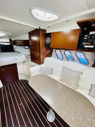 Seas The Day Yacht Photos Pics Interior of 2012 Cruisers 350 Express yacht with modern seating and dining area.