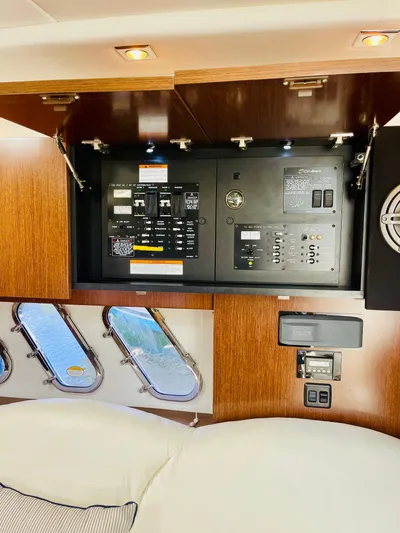 Seas The Day Yacht Photos Pics Electrical control panel inside a 2012 Cruisers 350 Express yacht.