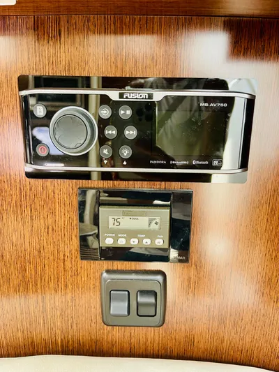 Seas The Day Yacht Photos Pics Fusion MS-AV750 stereo system and control panel in a 2012 Cruisers 350 Express boat.