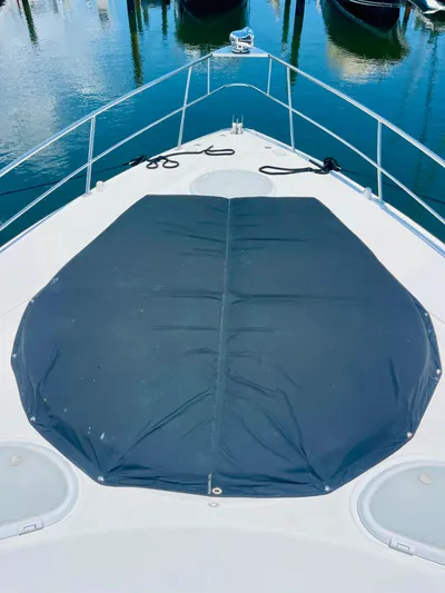 Seas The Day Yacht Photos Pics 2012 Cruisers 350 Express boat bow with sunpad cover.