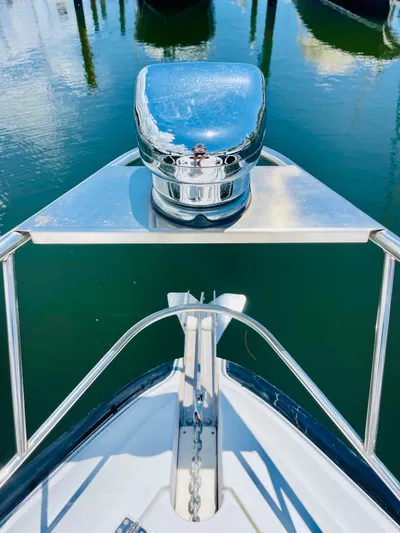 Seas The Day Yacht Photos Pics Bow of 2012 Cruisers 350 Express yacht with anchor windlass.