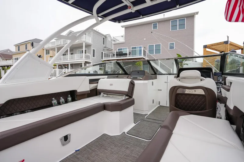 Plane To Sea Yacht Photos Pics Interior of 2022 Cobalt R8 boat with luxurious seating and modern design.