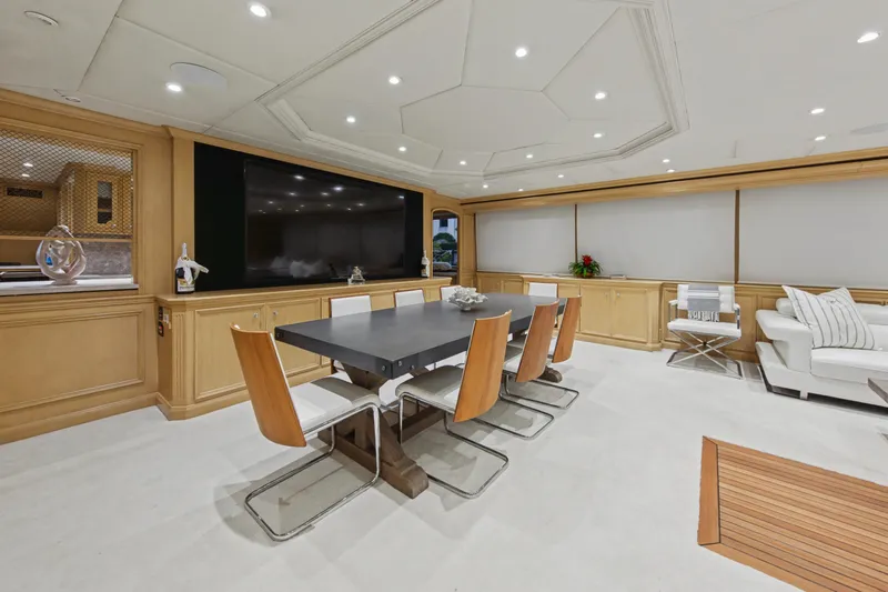 Savoir-faire Yacht Photos Pics Luxurious interior of 2002 Ocean Alexander 120 Megayacht with modern dining area and elegant decor.