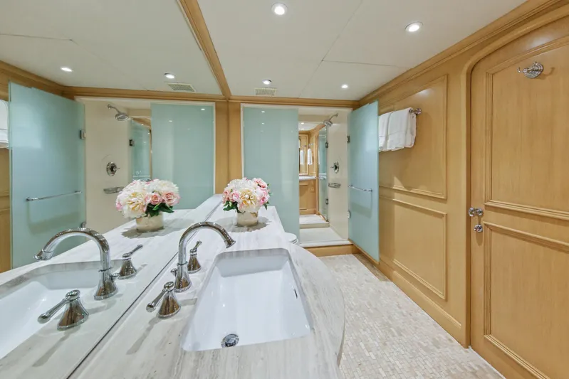Savoir-faire Yacht Photos Pics Luxurious bathroom on 2002 Ocean Alexander 120 Megayacht with dual sinks and elegant decor.