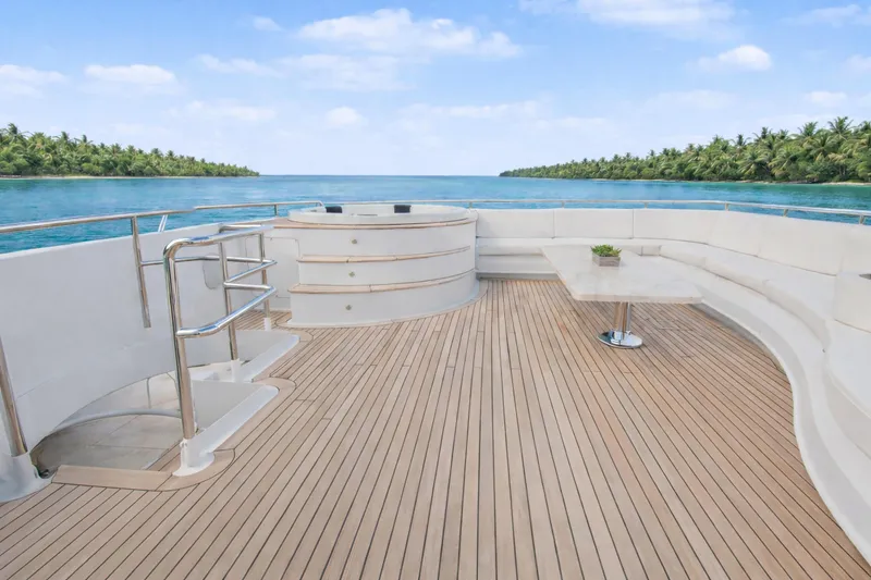 Savoir-faire Yacht Photos Pics Luxurious deck of 2002 Ocean Alexander 120 Megayacht with ocean view and elegant seating.