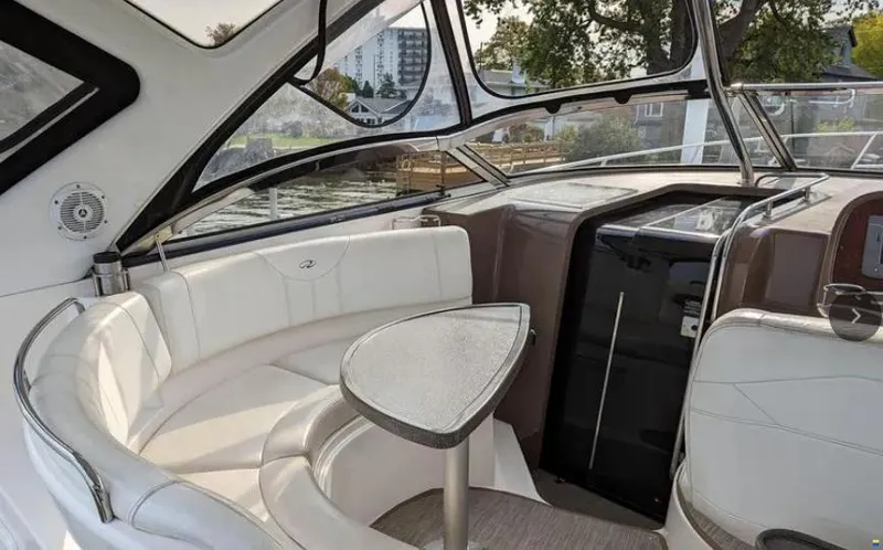  Yacht Photos Pics 2008 Regal Commodore 3760 IO yacht interior with white seating and table.