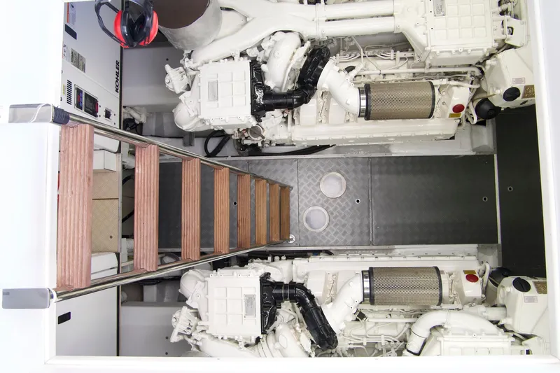 Antonina Yacht Photos Pics Engine room of 2010 Ferretti Yachts 800 with twin engines and wooden ladder.