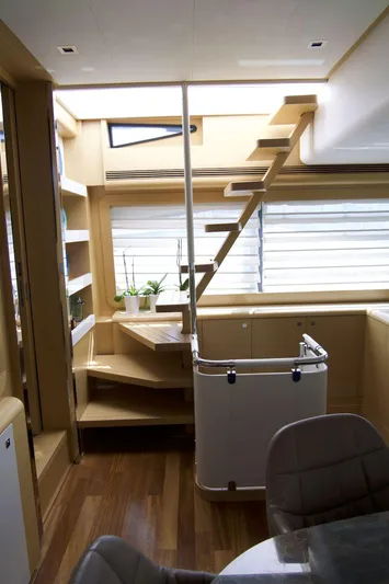Antonina Yacht Photos Pics Interior of 2010 Ferretti Yachts 800, featuring modern staircase and elegant wood finishes.