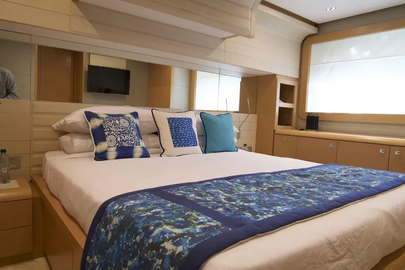 Antonina Yacht Photos Pics Luxurious bedroom interior of 2010 Ferretti Yachts 800 with elegant bedding and modern design.
