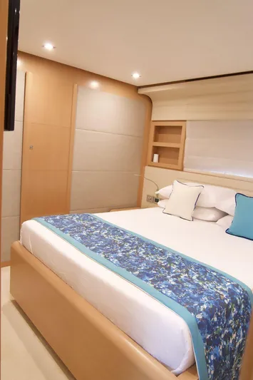 Antonina Yacht Photos Pics Luxurious bedroom interior of 2010 Ferretti Yachts 800 with elegant bedding and modern design.