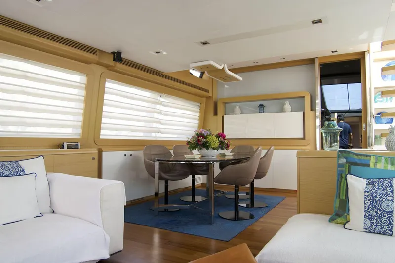 Antonina Yacht Photos Pics Luxurious interior of 2010 Ferretti Yachts 800 with elegant dining area and modern decor.