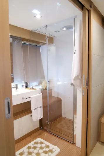Antonina Yacht Photos Pics Luxurious bathroom in a 2010 Ferretti Yachts 800, featuring modern shower and sleek design.