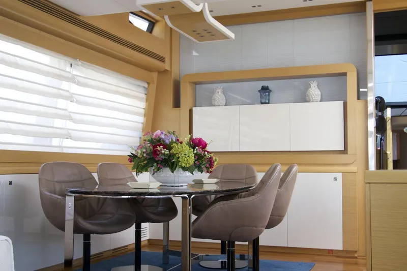 Antonina Yacht Photos Pics Luxurious interior of 2010 Ferretti Yachts 800 with elegant dining area and modern decor.