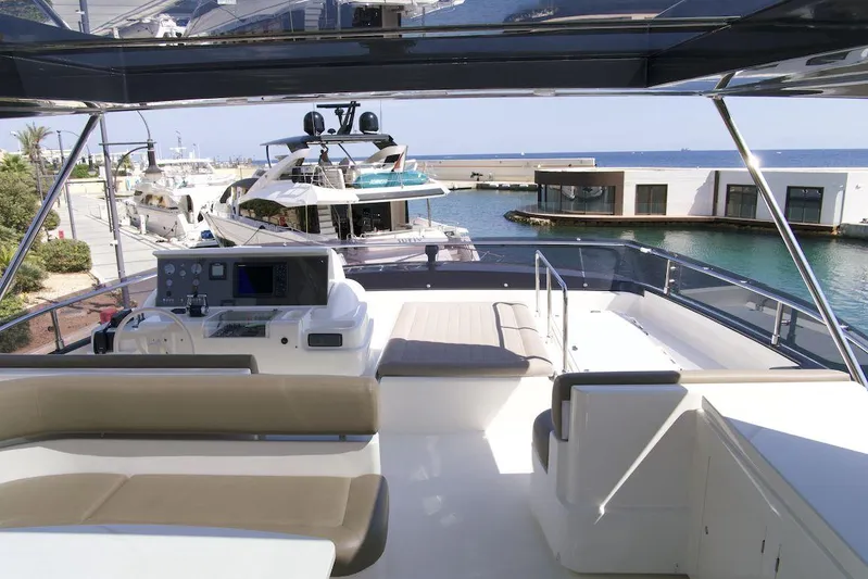 Antonina Yacht Photos Pics Luxurious 2010 Ferretti Yachts 800 with spacious deck and modern amenities, docked at marina.