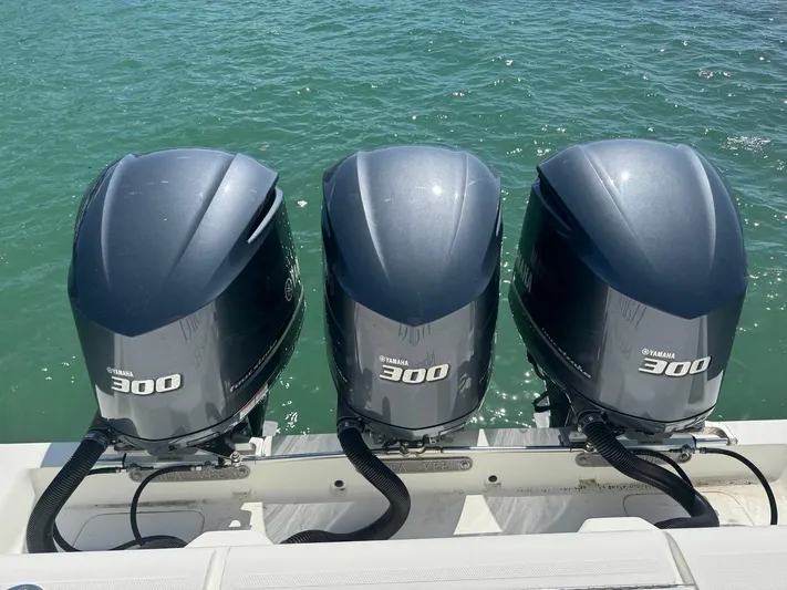 Warbird Yacht Photos Pics Three Yamaha 300 outboard engines on a 2014 SeaVee 390B Center Console boat.