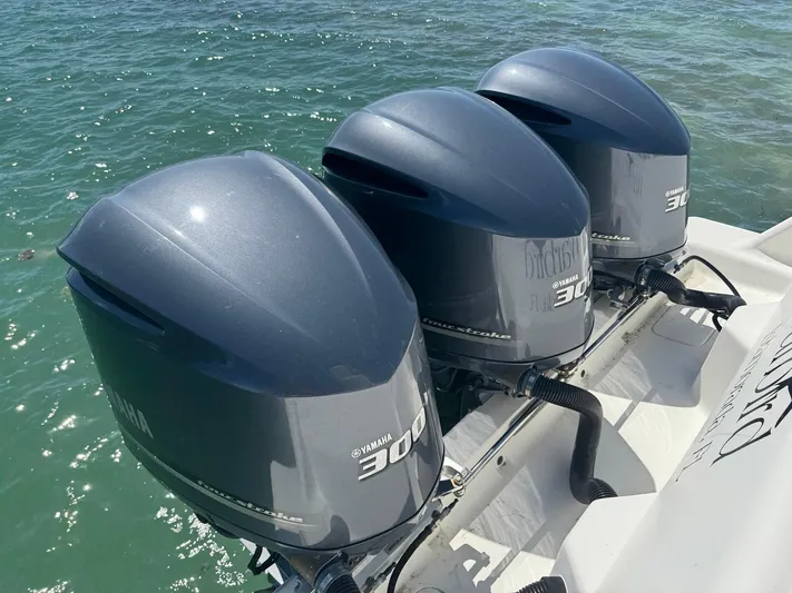 Warbird Yacht Photos Pics Three Yamaha 300 outboard engines on a 2014 SeaVee 390B Center Console boat.