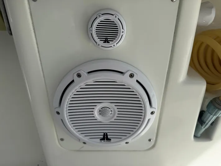 Warbird Yacht Photos Pics Speakers on 2014 SeaVee 390B Center Console boat, featuring white grilles and marine design.