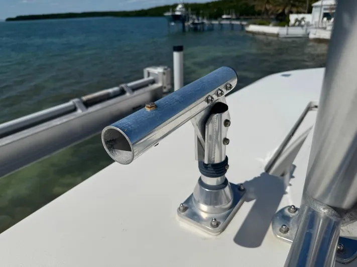 Warbird Yacht Photos Pics Rod holder on 2014 SeaVee 390B Center Console boat, docked by the water.