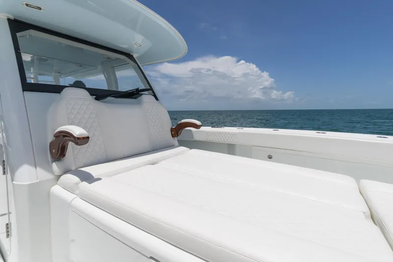  Yacht Photos Pics Luxurious seating on a 2022 Freeman 43 boat, with ocean view and clear skies.