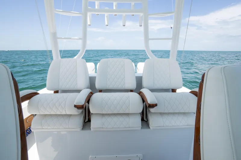  Yacht Photos Pics Luxury seating on a 2022 Freeman 43 boat, overlooking the ocean.