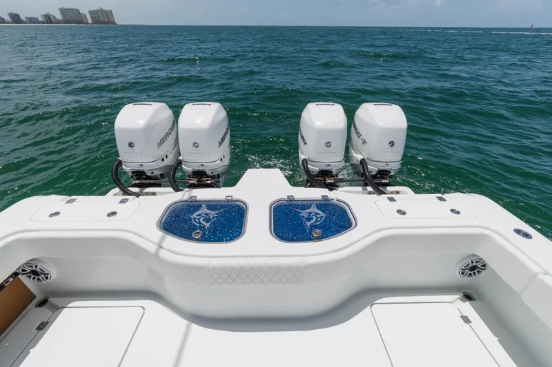  Yacht Photos Pics Freeman 43 boat with four Mercury outboard engines on open water, 2022 model.