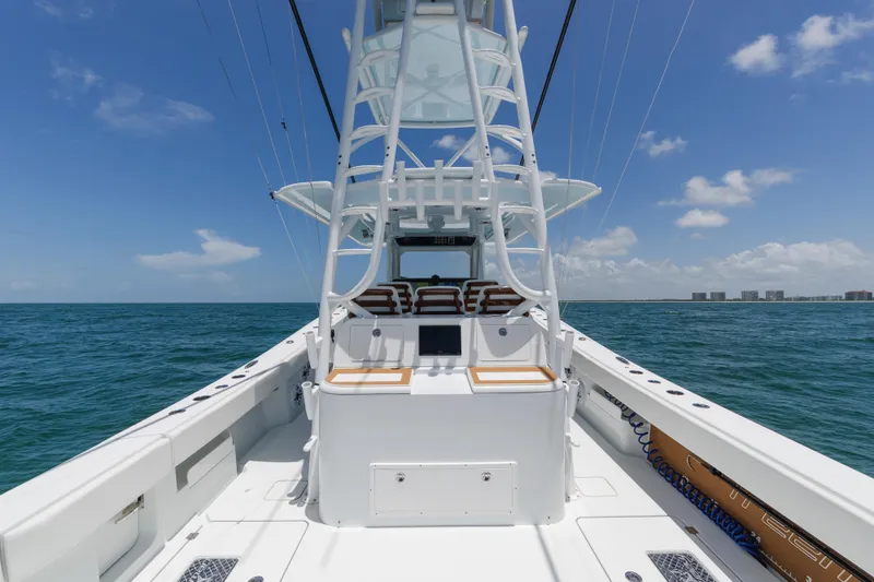 Yacht Photos Pics Freeman 43 boat, 2022 model, cruising on open sea under clear blue sky.