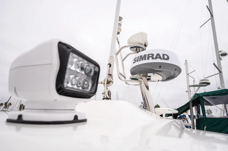 La Sirena Yacht Photos Pics Radar and spotlight on 2014 Jeanneau NC 14 boat, featuring Simrad equipment.