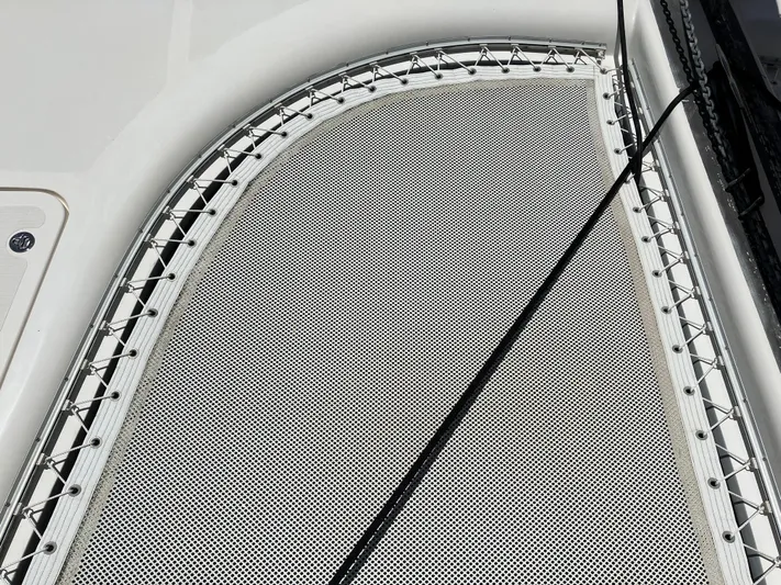 Bel Tempo Yacht Photos Pics Close-up of 2008 Manta 42 MkIV catamaran trampoline netting.