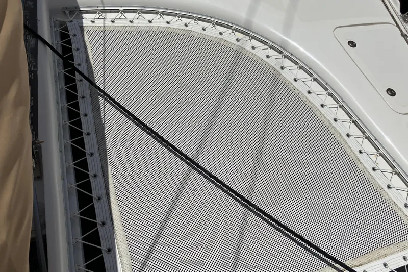 Bel Tempo Yacht Photos Pics Manta 42 MkIV 2008 catamaran deck with netting and rigging details.