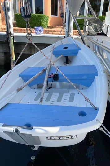 Bel Tempo Yacht Photos Pics 2008 Manta 42 MkIV sailboat with blue and white deck, docked at marina.
