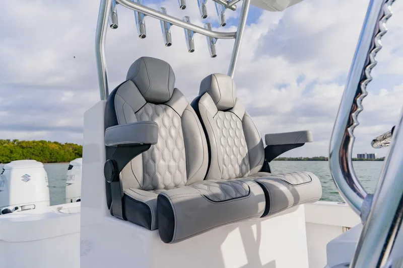  Yacht Photos Pics Luxurious seating on 2024 Orion 29CC boat with scenic water backdrop.