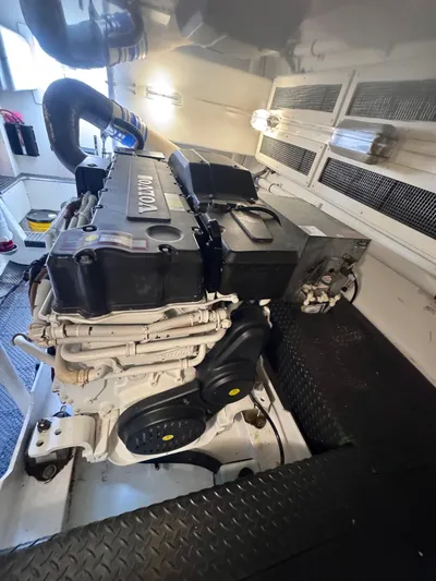 A Whole New World Yacht Photos Pics Engine room of a 2006 Silverton 50 Convertible yacht with Volvo engine.