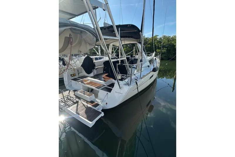 Lele Kalua Yacht Photos Pics 2014 Beneteau Oceanis 41 sailboat docked, featuring a spacious deck and modern design.