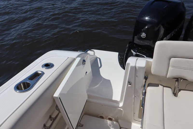  Yacht Photos Pics 2023 Boston Whaler 350 Realm boat deck with open door and engine view.