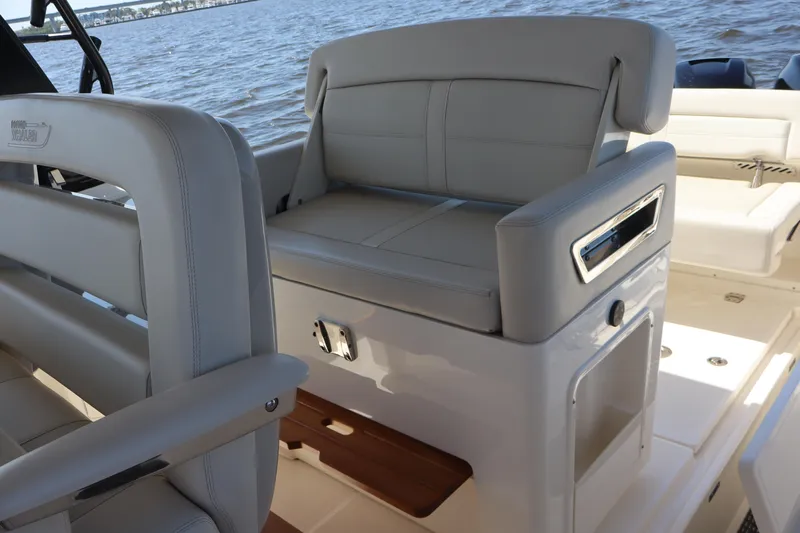  Yacht Photos Pics 2023 Boston Whaler 350 Realm interior with luxurious seating and ocean view.
