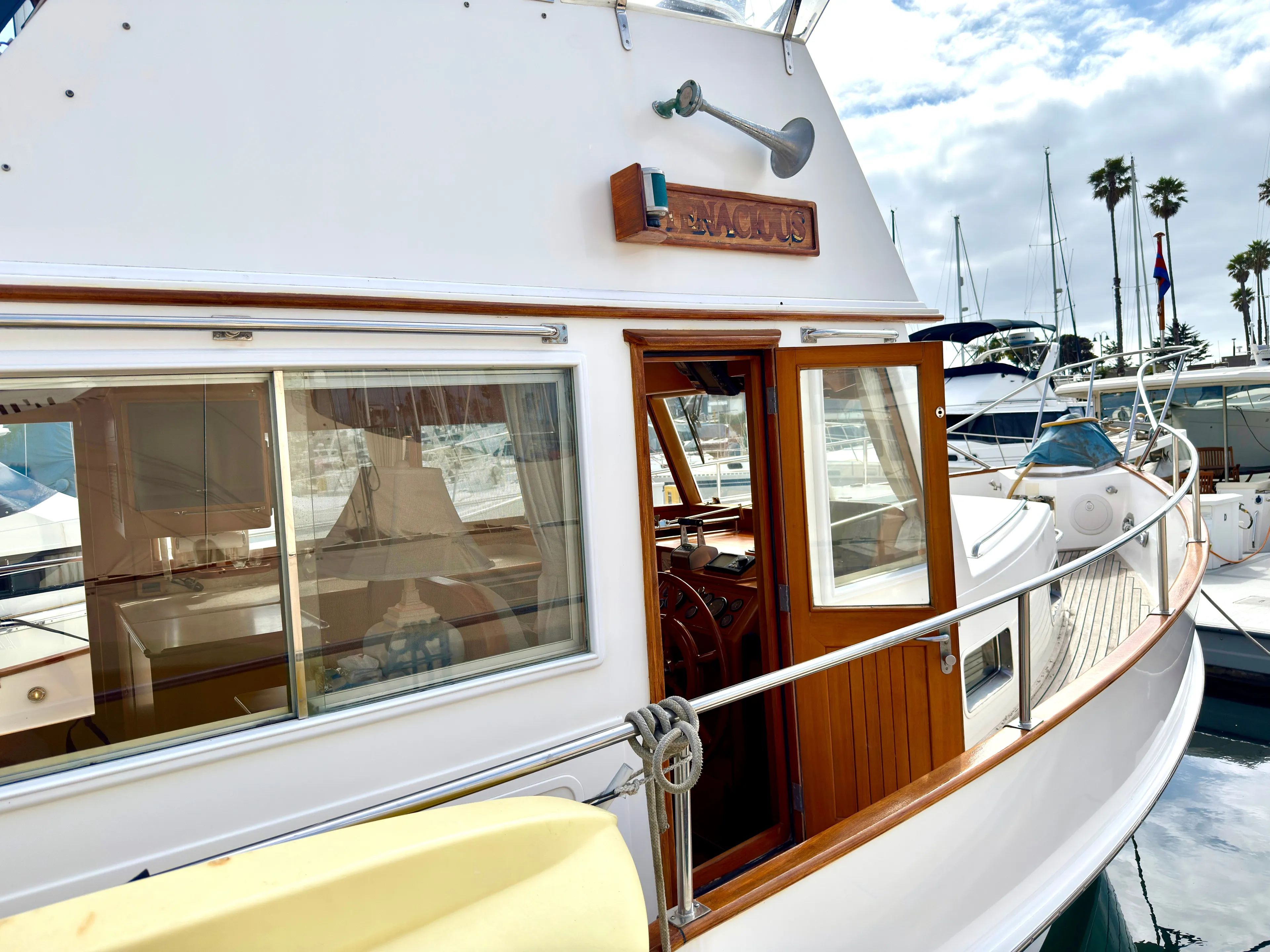 Tenacious Yacht Photos Pics 2003 Grand Banks Classic yacht docked at marina, sunny day.