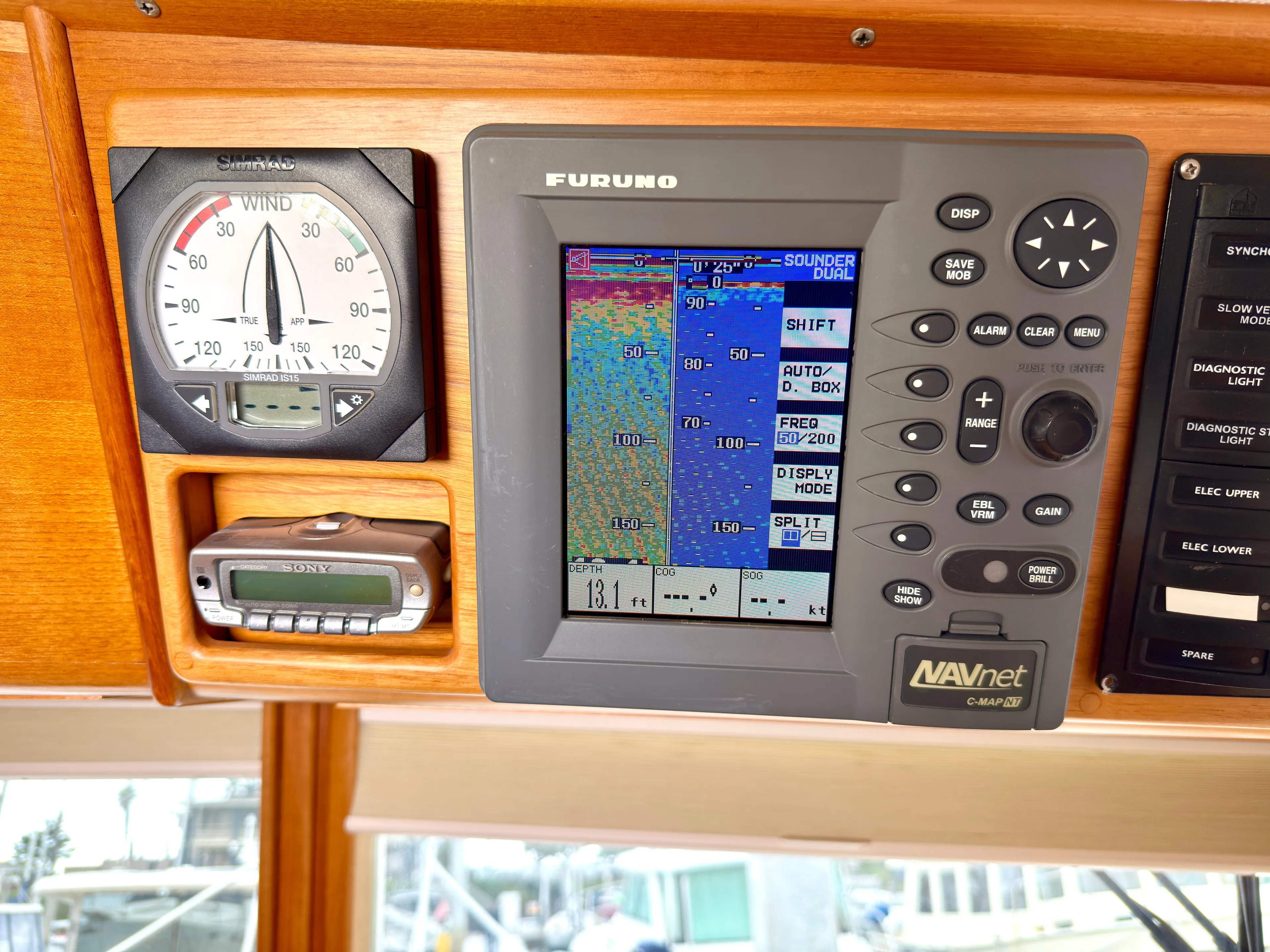 Tenacious Yacht Photos Pics Navigation system on 2003 Grand Banks Classic with Furuno and Simrad instruments.