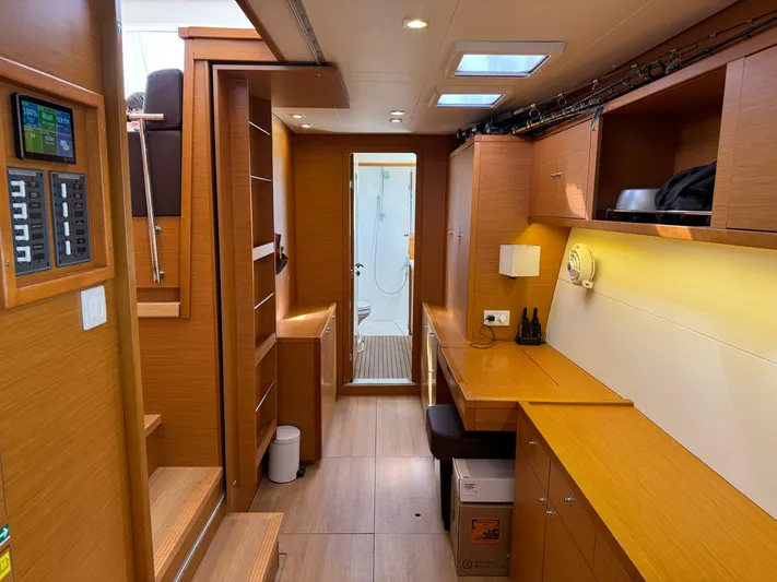  Yacht Photos Pics Interior of 2017 Lagoon 450 F catamaran with wooden cabinetry and modern design.