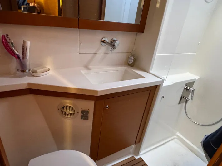  Yacht Photos Pics Bathroom interior of 2017 Lagoon 450 F yacht with sink and shower.