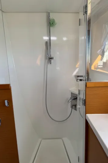  Yacht Photos Pics Shower area in 2017 Lagoon 450 F catamaran, featuring sleek design and modern fixtures.
